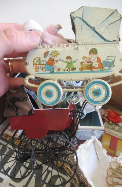 A quantity of dolls prams Image