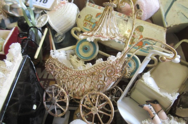 A quantity of dolls prams Image