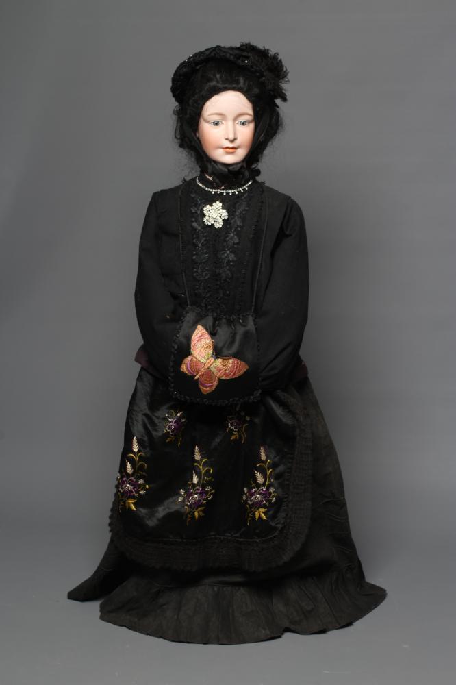 A very large Armand Marseille bisque head doll possibly modelled as Queen Victoria Image