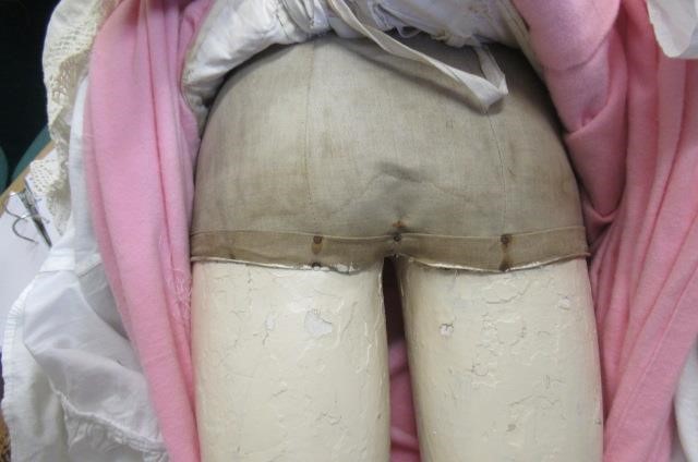 A very large Armand Marseille bisque head doll possibly modelled as Queen Victoria Image