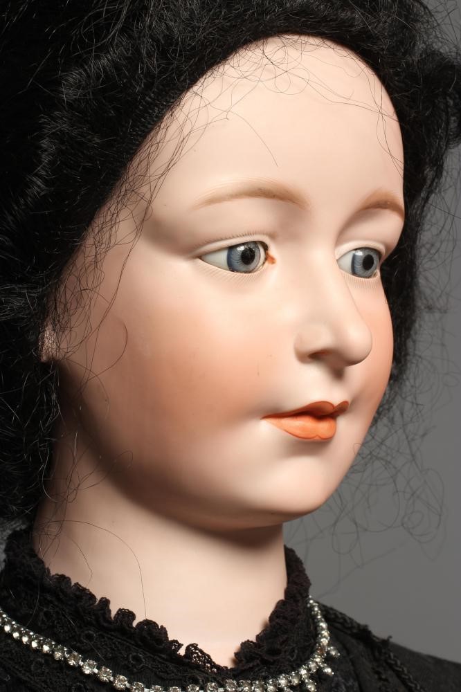 A very large Armand Marseille bisque head doll possibly modelled as Queen Victoria Image
