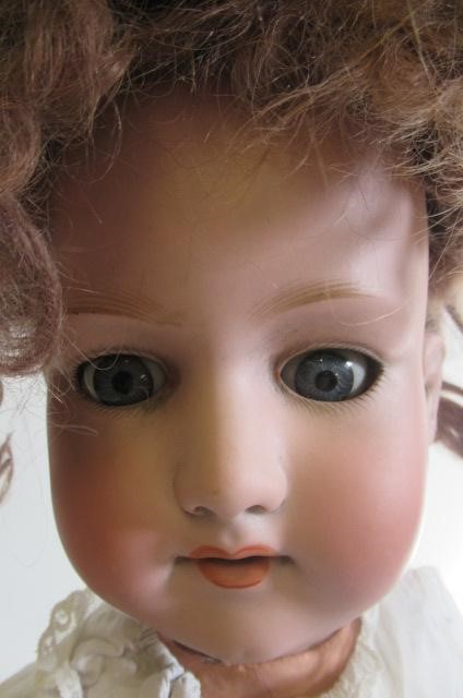 An Armand Marseille bisque socket head doll Image