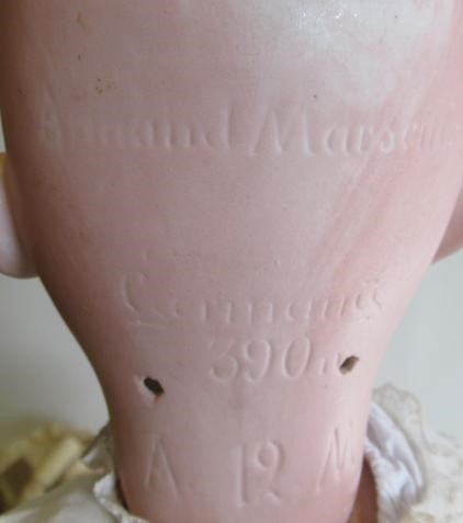 An Armand Marseille bisque socket head doll Image