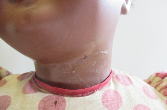 A Simon & Halbig bisque socket head mulatto doll Image