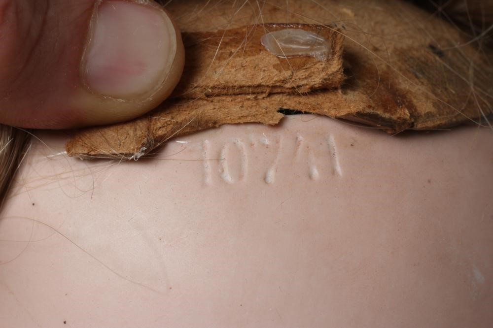 A Heubach bisque socket head doll Image