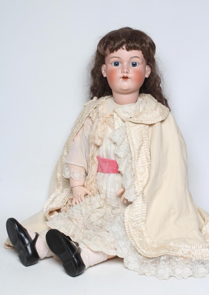 A large Armand Marseille bisque socket head doll Image