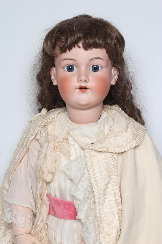 A large Armand Marseille bisque socket head doll Image