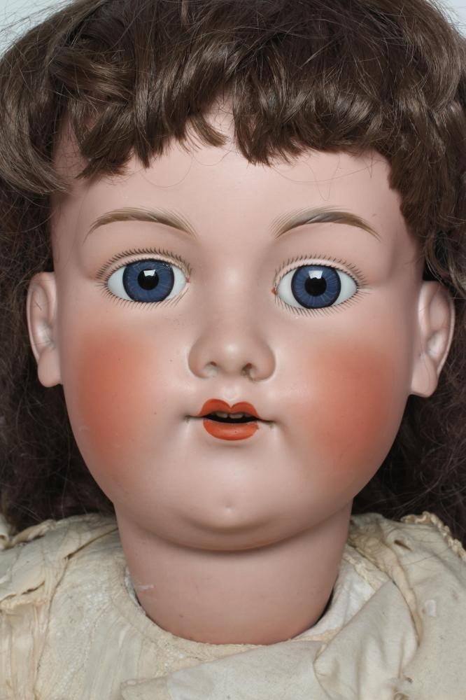 A large Armand Marseille bisque socket head doll Image