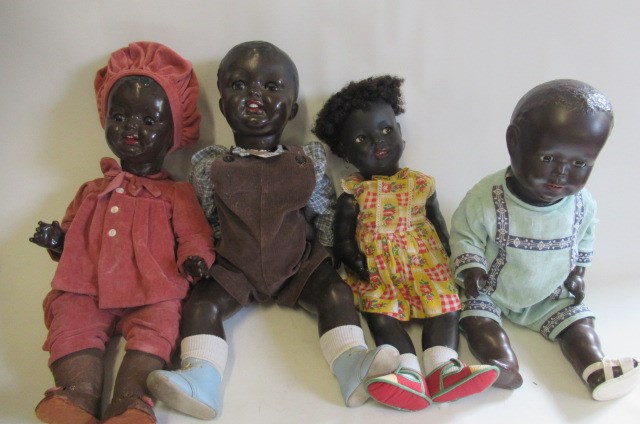 Four composition mulatto dolls Image
