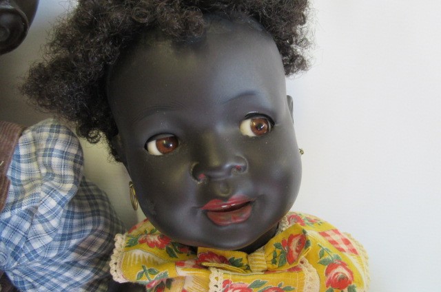 Four composition mulatto dolls Image