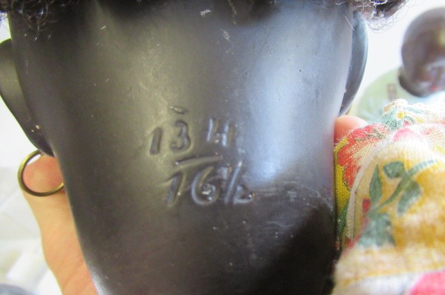 Four composition mulatto dolls Image