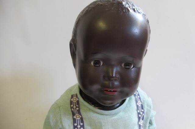 Four composition mulatto dolls Image