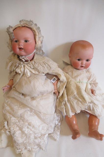 Two Armand Marseille bisque socket head dolls Image
