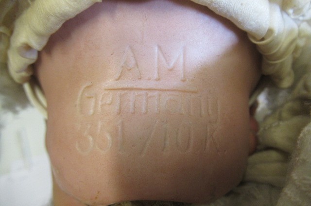 Two Armand Marseille bisque socket head dolls Image