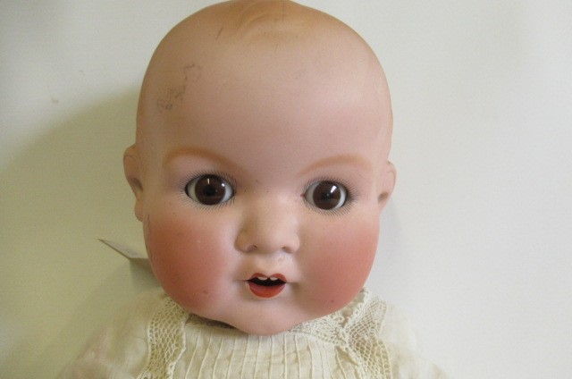 Two Armand Marseille bisque socket head dolls Image