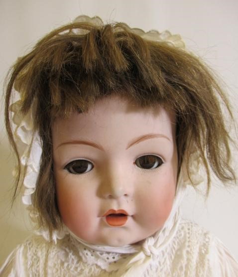 A Heubach bisque socket head doll Image