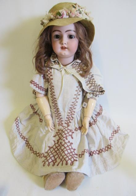 A large Simon & Halbig bisque socket head doll Image