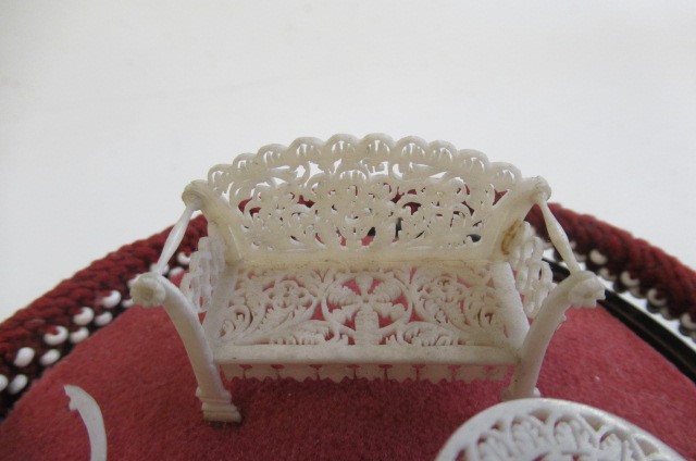 Three pieces of carved and pierced bone dolls house furniture Image