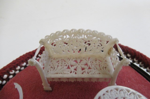 Three pieces of carved and pierced bone dolls house furniture Image