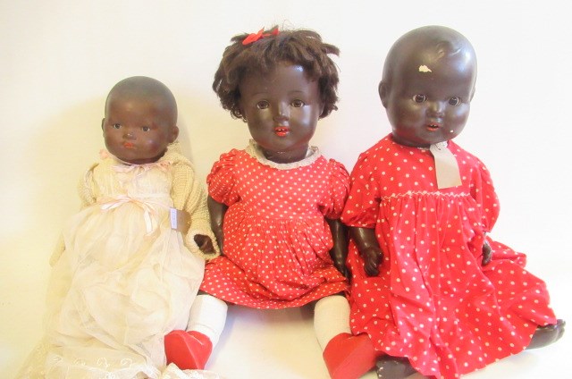 Two Armand Marseille mulatto socket head dolls Image