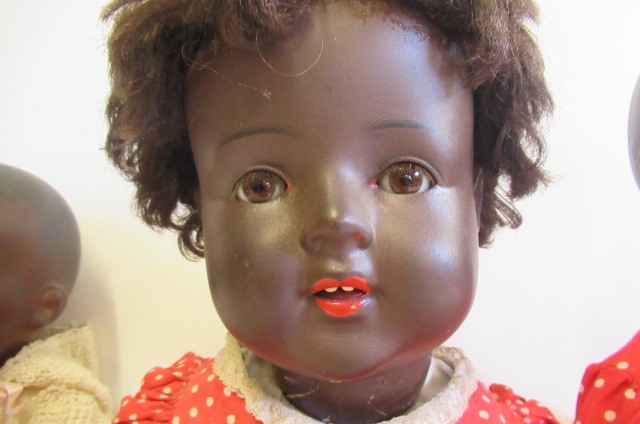 Two Armand Marseille mulatto socket head dolls Image