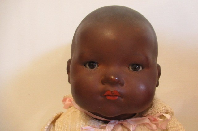 Two Armand Marseille mulatto socket head dolls Image