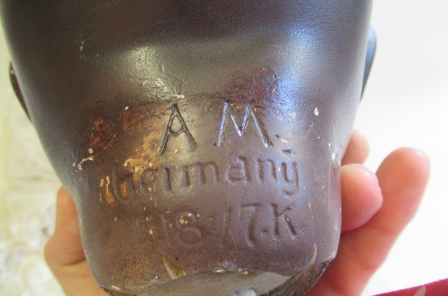 Two Armand Marseille mulatto socket head dolls Image