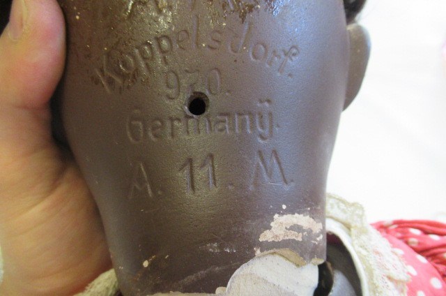 Two Armand Marseille mulatto socket head dolls Image