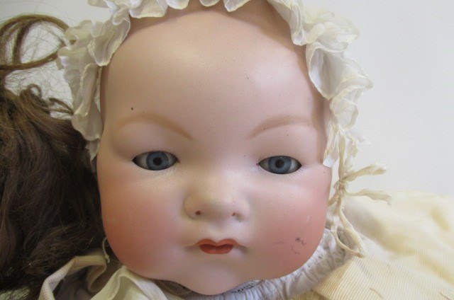 Two Armand Marseille bisque socket head dolls Image