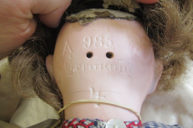 Two Armand Marseille bisque socket head dolls Image