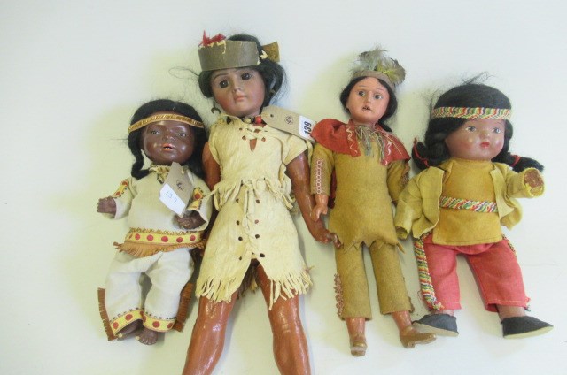 Two Native American themed bisque socket head dolls Image