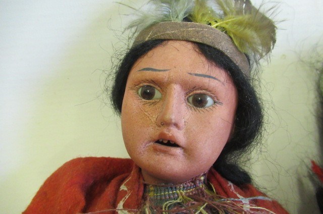 Two Native American themed bisque socket head dolls Image