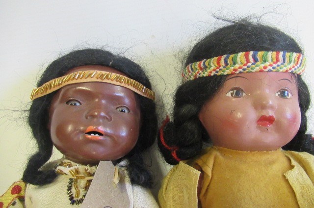 Two Native American themed bisque socket head dolls Image