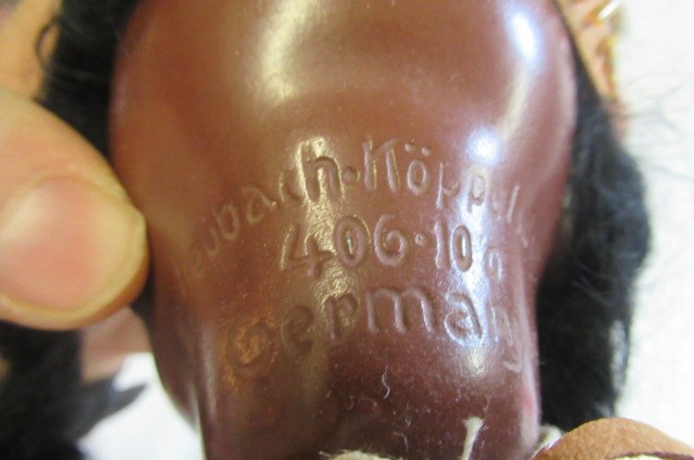 Two Native American themed bisque socket head dolls Image