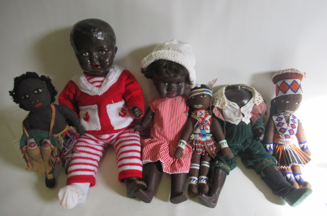 Three mulatto composition dolls Image