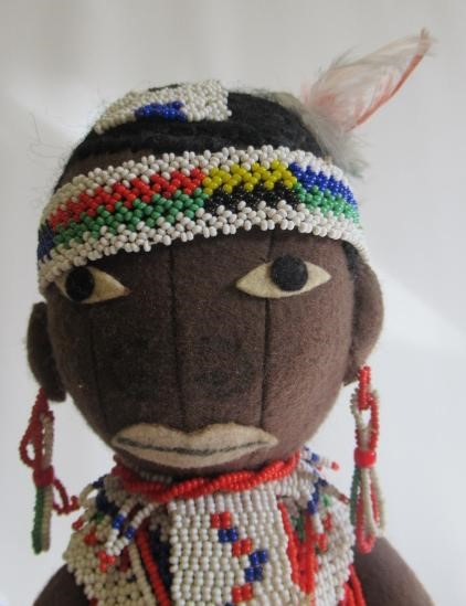 Three mulatto composition dolls Image