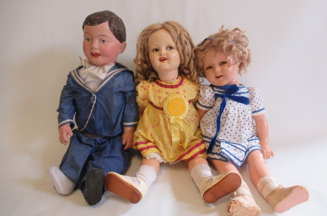 Two composition head flirty girl dolls Image