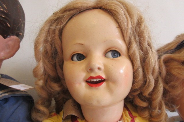 Two composition head flirty girl dolls Image