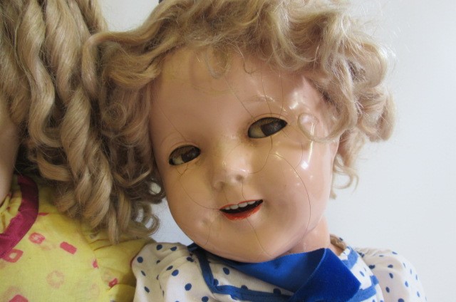 Two composition head flirty girl dolls Image