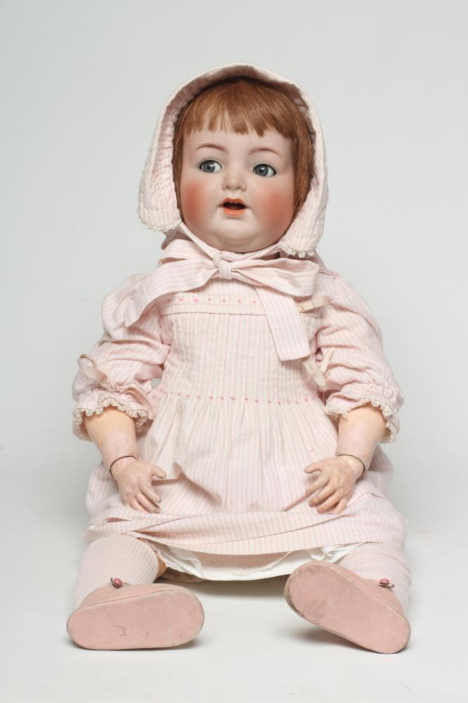 A Kammer & Reinhardt bisque socket head flirty doll Image