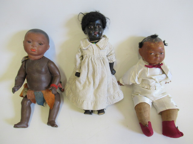 Two bisque socket head mulatto dolls Image