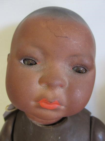 Two bisque socket head mulatto dolls Image