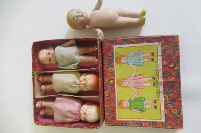 A boxed set of three Paradise dolls Image