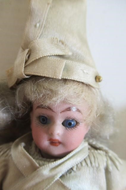 A small bisque socket head doll Image