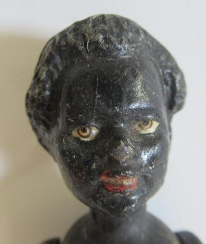 A small bisque socket head doll Image