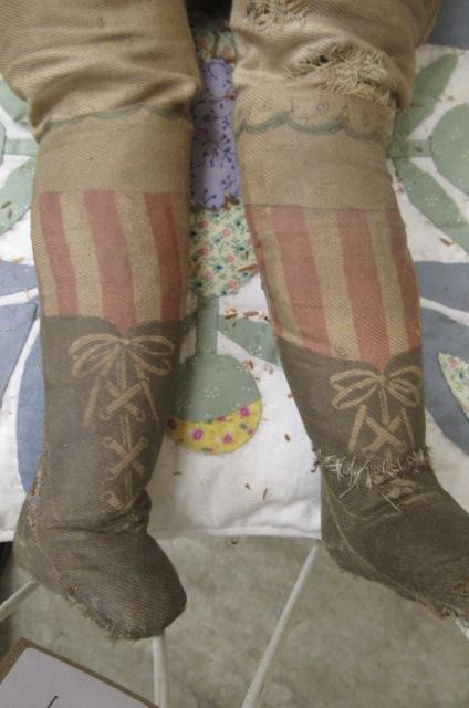 Two dolls beds and a raised crib Image