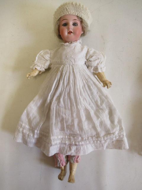 A bisque socket head doll Image