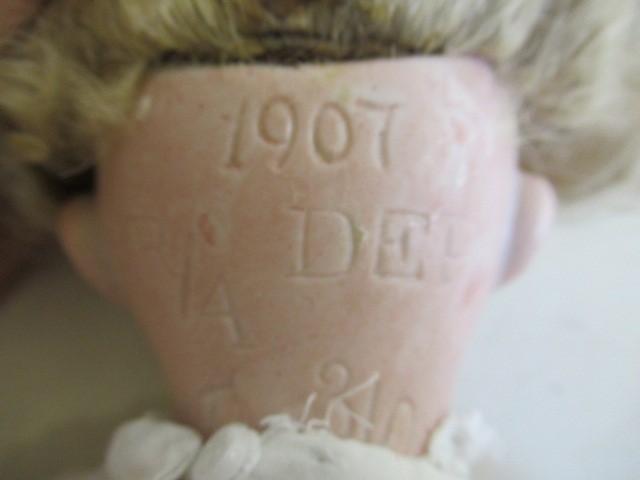 A bisque socket head doll Image