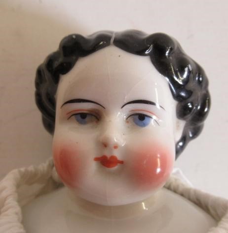 A china shoulder head doll Image