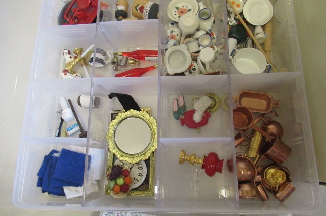 A large quantity of dolls house furniture and equipment Image
